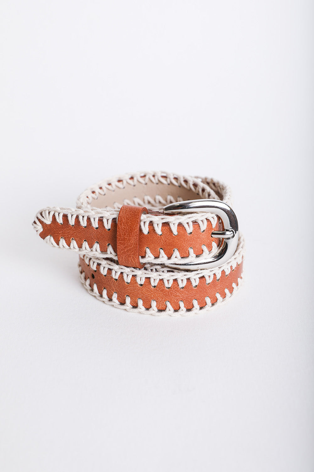 A stylish Crochet Vegan Leather Belt featuring unique crochet detailing, adjustable fit, and made from eco-friendly vegan leather.