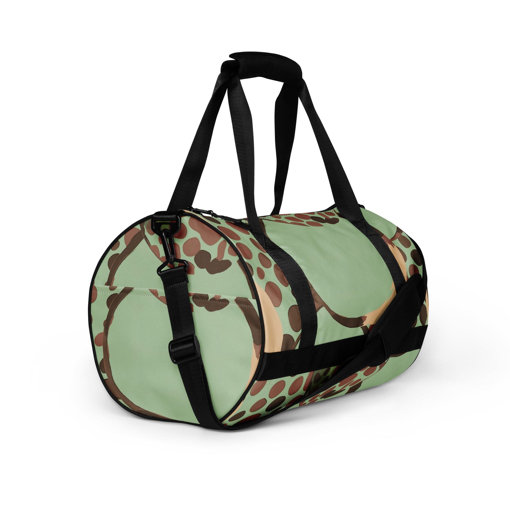 Crossbody water-resistant travel bag in mint green with brown spots, featuring dual padded handles and multiple pockets.