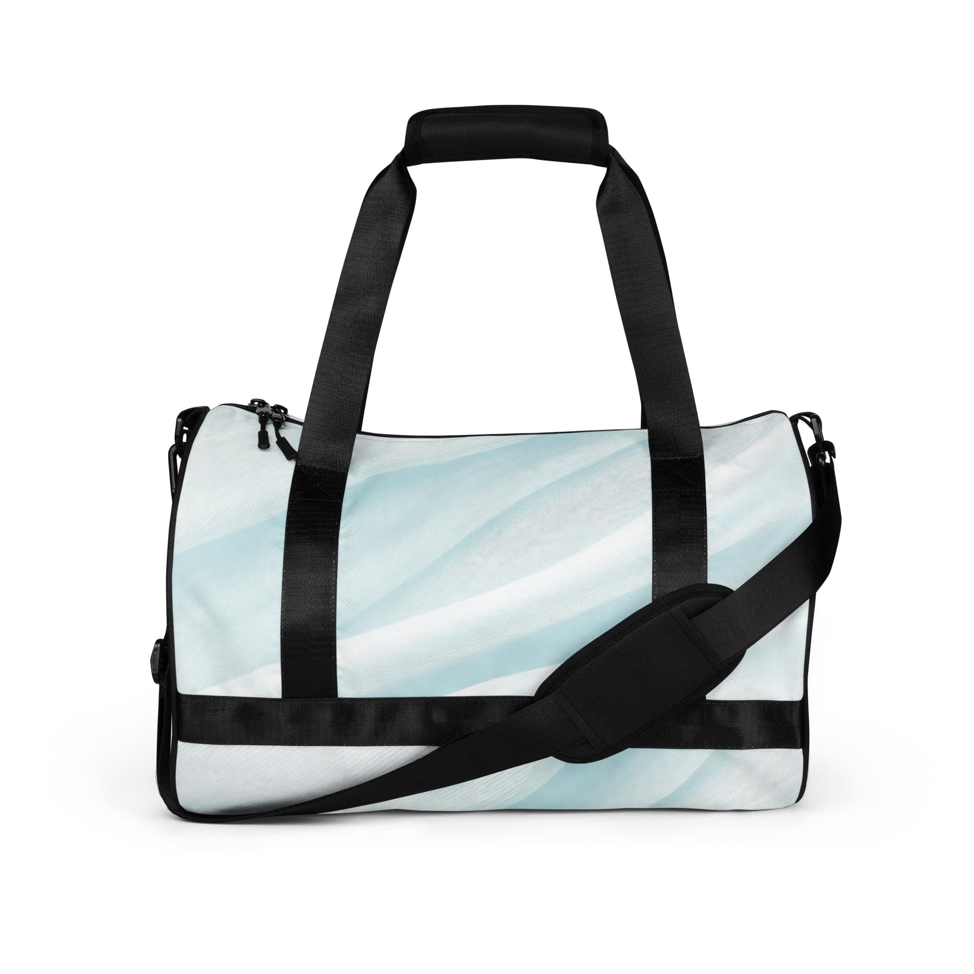 Crossbody water-resistant travel bag in pastel blue swirl, featuring dual padded handles and multiple pockets for organization.