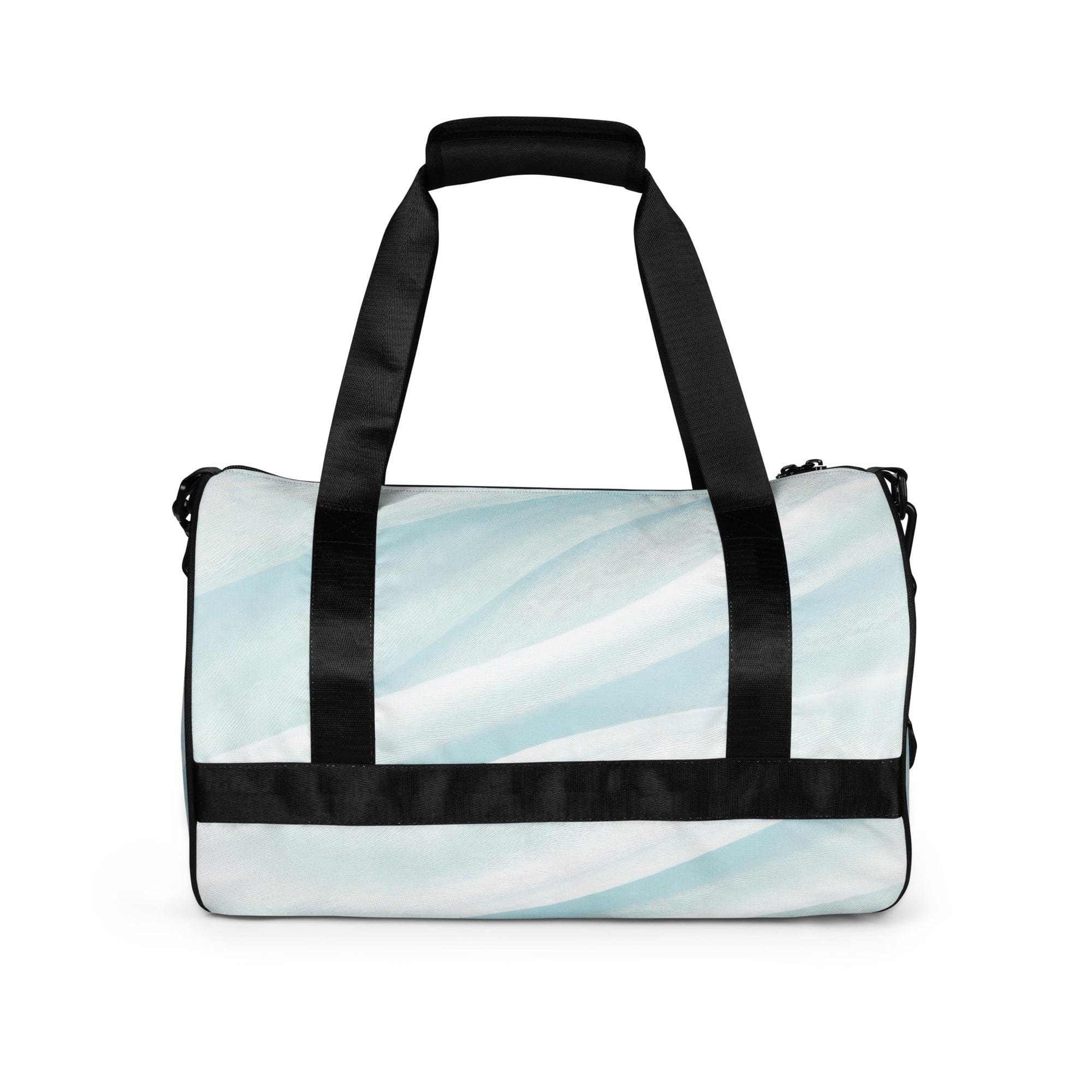 Crossbody water-resistant travel bag in pastel blue swirl, featuring dual padded handles and multiple pockets for organization.