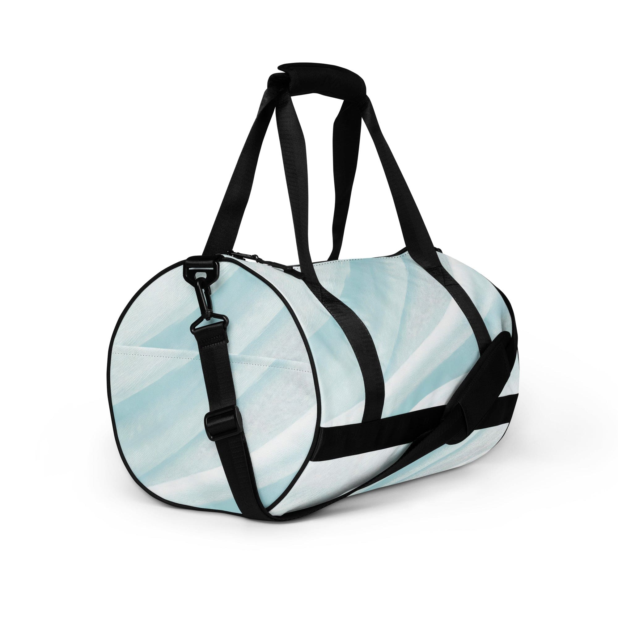 Crossbody water-resistant travel bag in pastel blue swirl, featuring dual padded handles and multiple pockets for organization.