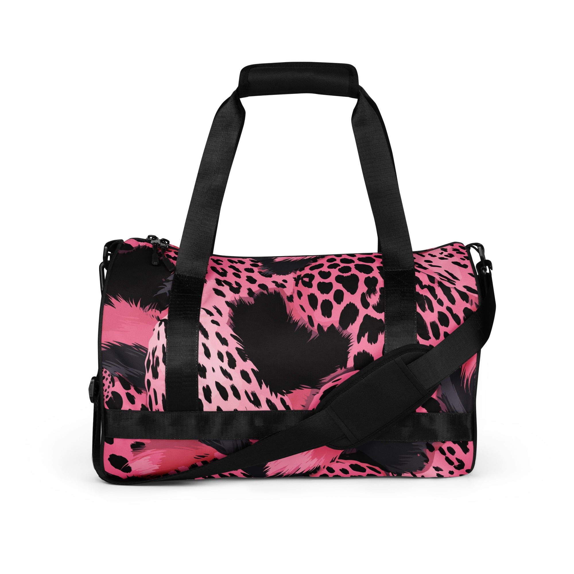 Crossbody water-resistant travel bag in pink and black spotted design, featuring dual padded handles and multiple pockets.