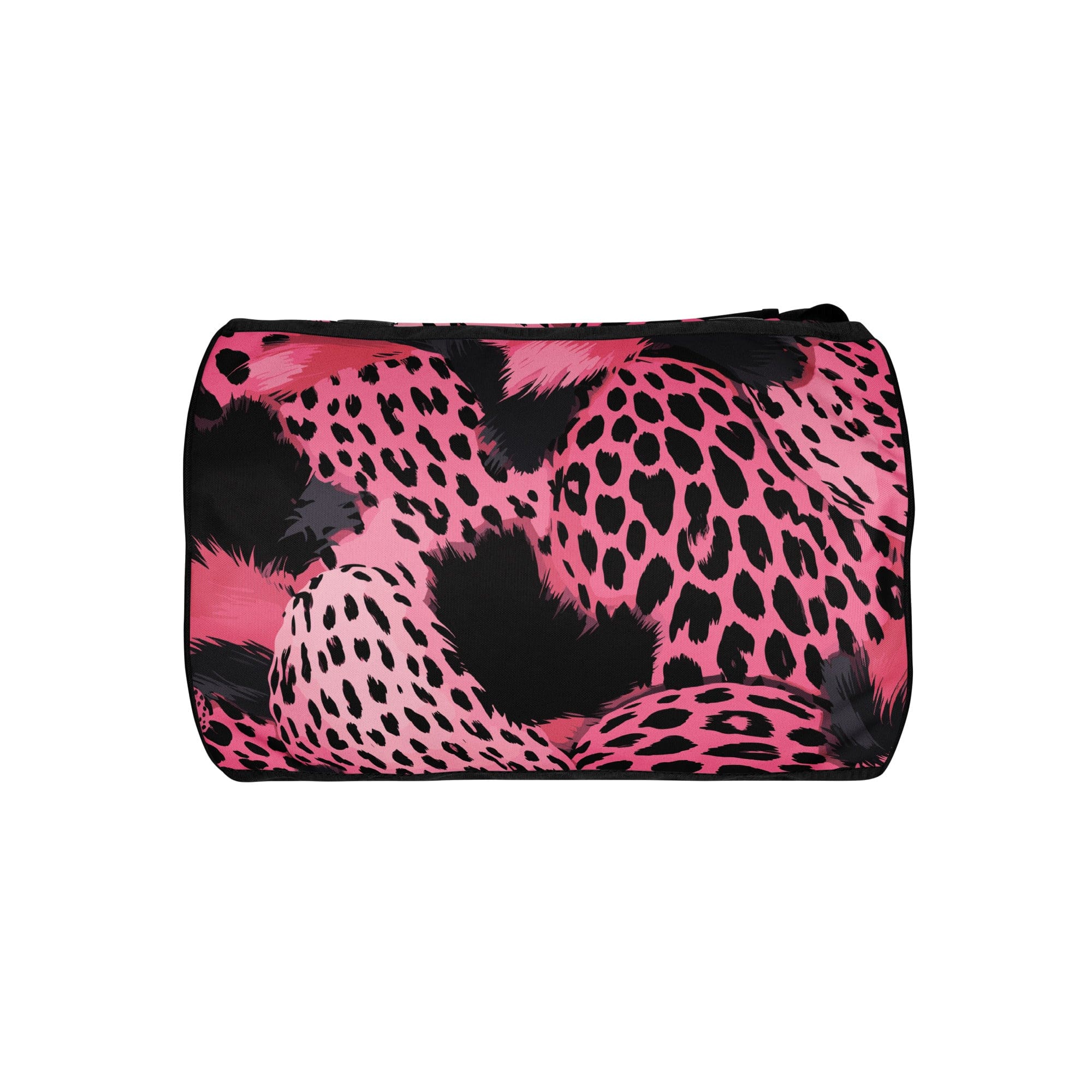 Crossbody water-resistant travel bag in pink and black spotted design, featuring dual padded handles and multiple pockets.