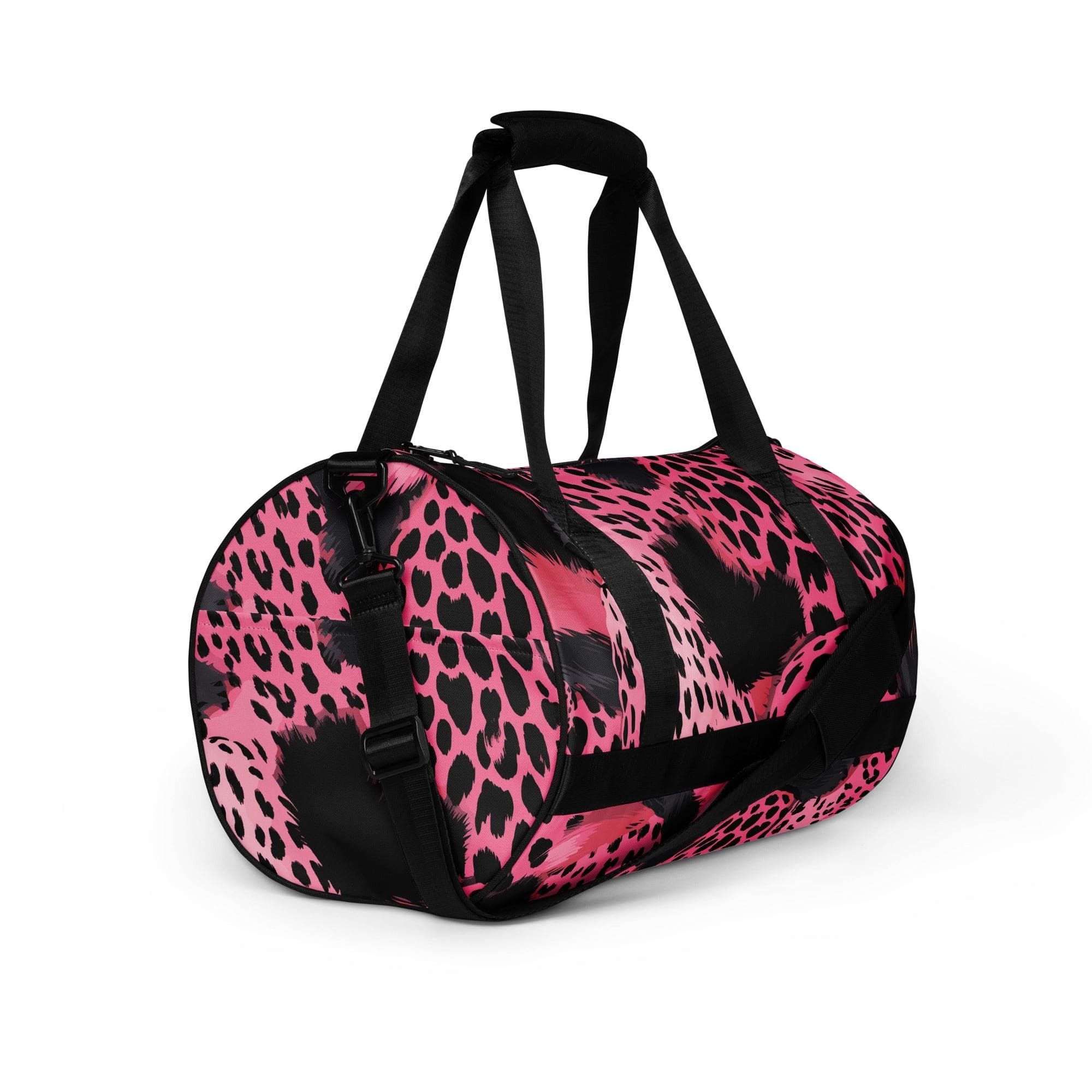 Crossbody water-resistant travel bag in pink and black spotted design, featuring dual padded handles and multiple pockets.