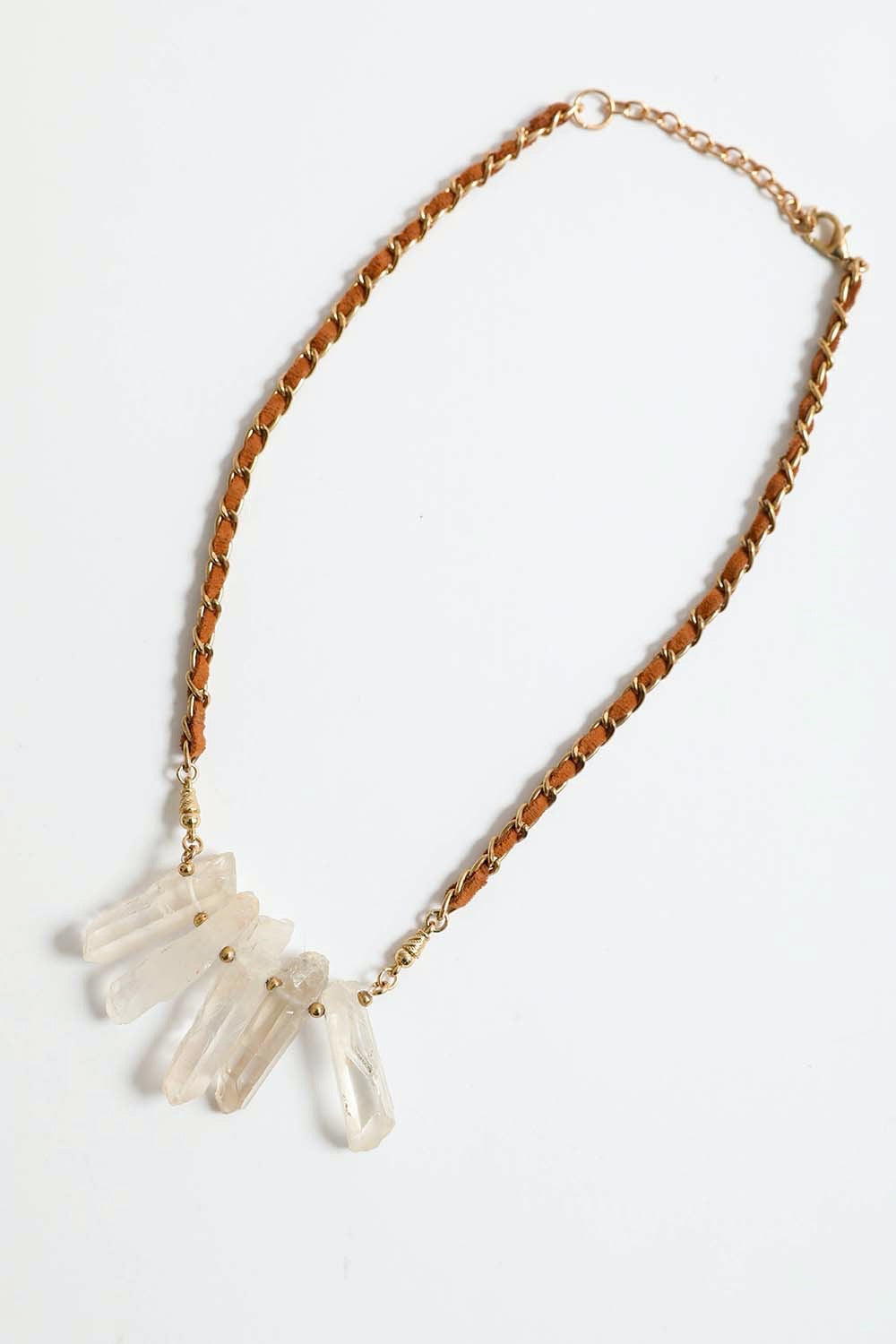 A stylish Crystal Drop Suede Necklace featuring delicate crystals on a soft suede cord, perfect for casual or elegant outfits.