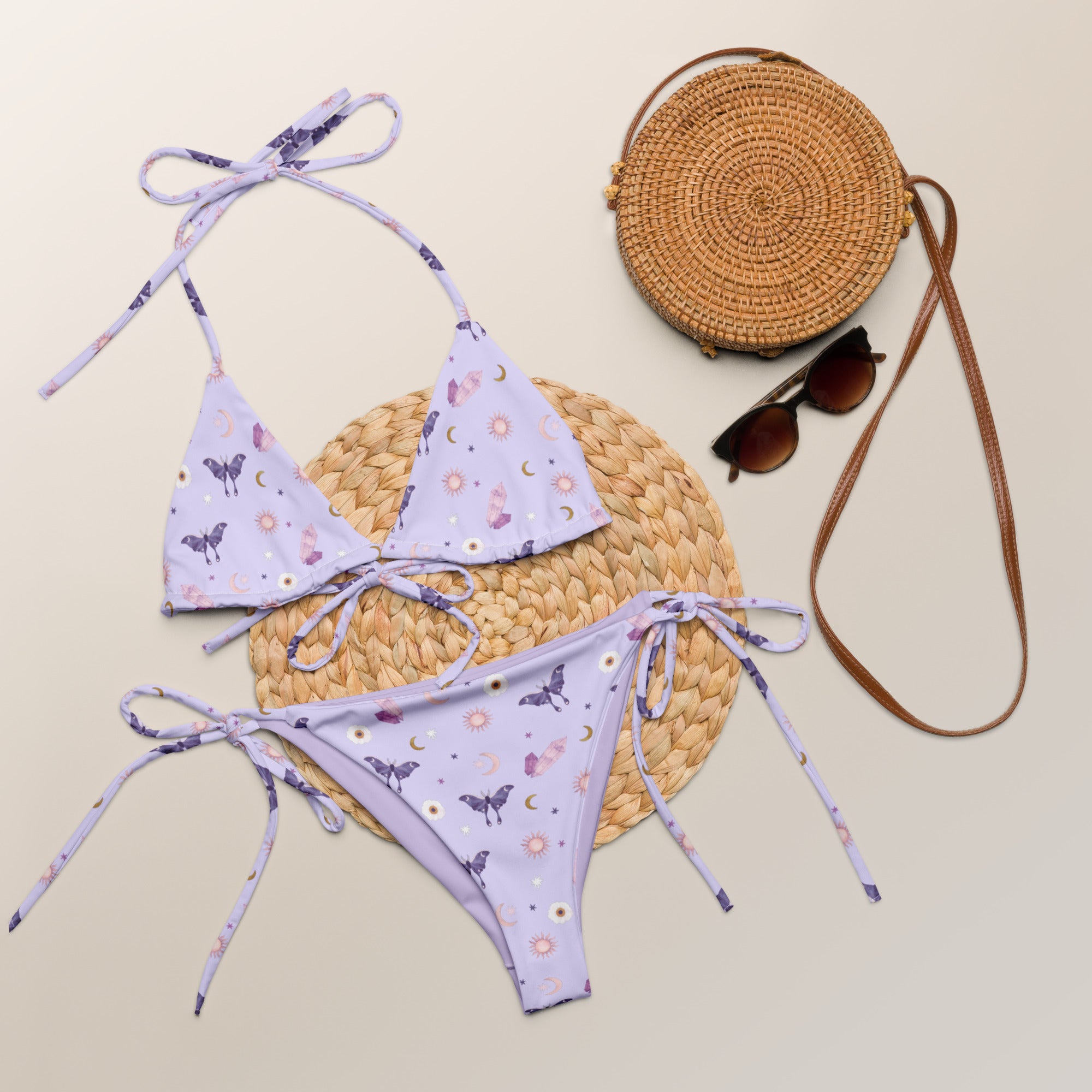 Crystal Moon Moth String Bikini featuring zodiac symbols, soft fabric, and adjustable straps, perfect for beachwear.