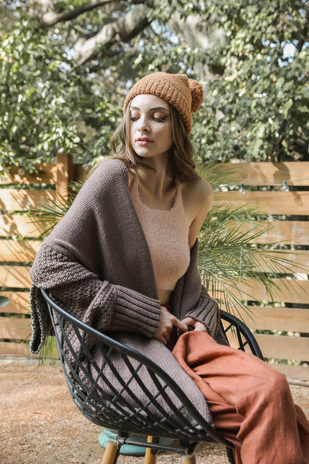 Cuddly Bat Sleeve Knit Cardigan in a cozy oversized fit, showcasing its stylish bat sleeves and soft texture.