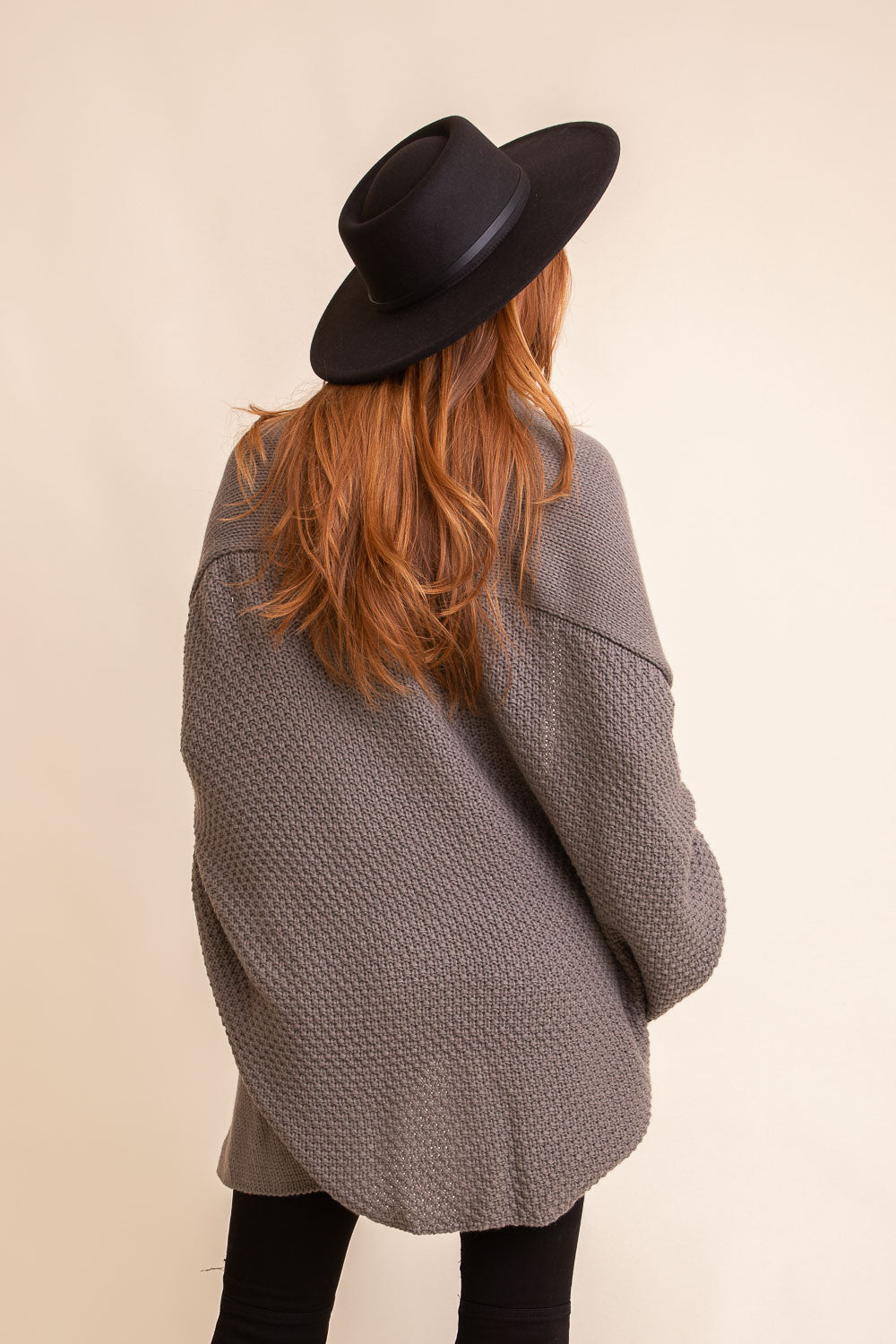 Cuddly Bat Sleeve Knit Cardigan in a cozy oversized fit, showcasing its stylish bat sleeves and soft texture.