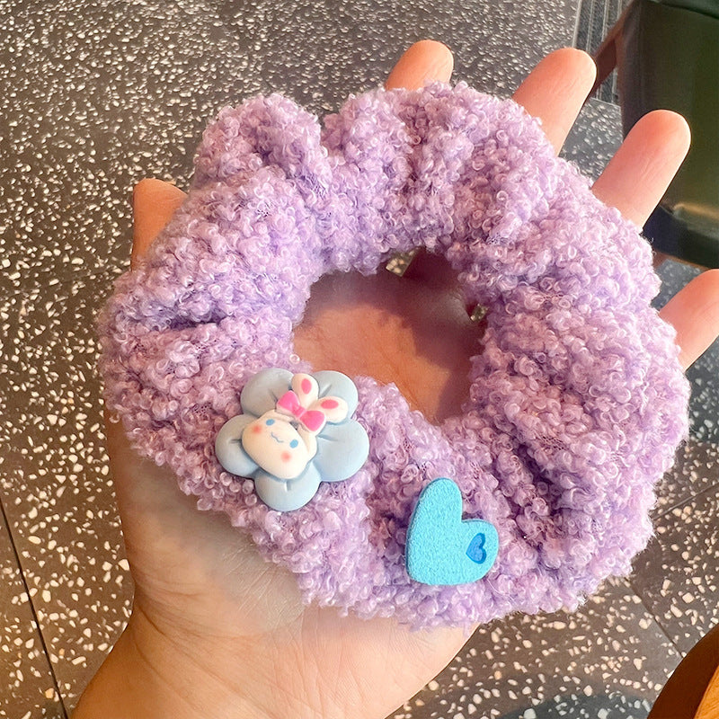 Curly Plush Rabbit Hair Tie featuring a cute rabbit design made from soft plush material, perfect for adding charm to hairstyles.