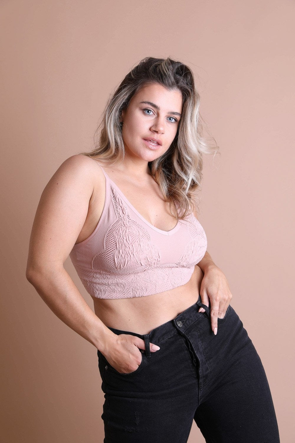 Curvy Seamless Padded Textured Brami Plus in stylish design, featuring adjustable straps and textured pattern.