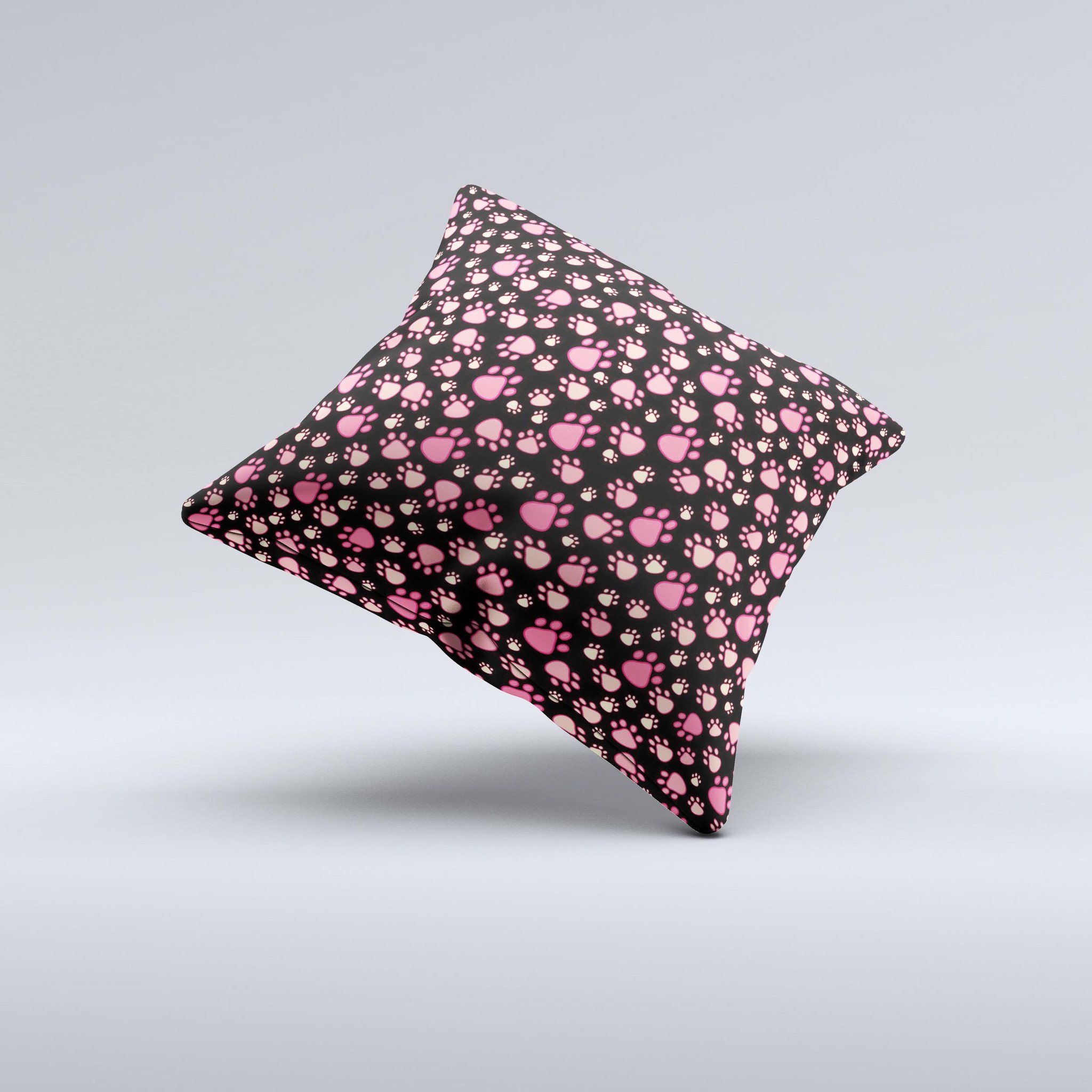 Cut Pink Paw Prints Ink-Fuzed Decorative Throw Pillow featuring a unique paw print design on a soft fabric, handcrafted in Virginia.