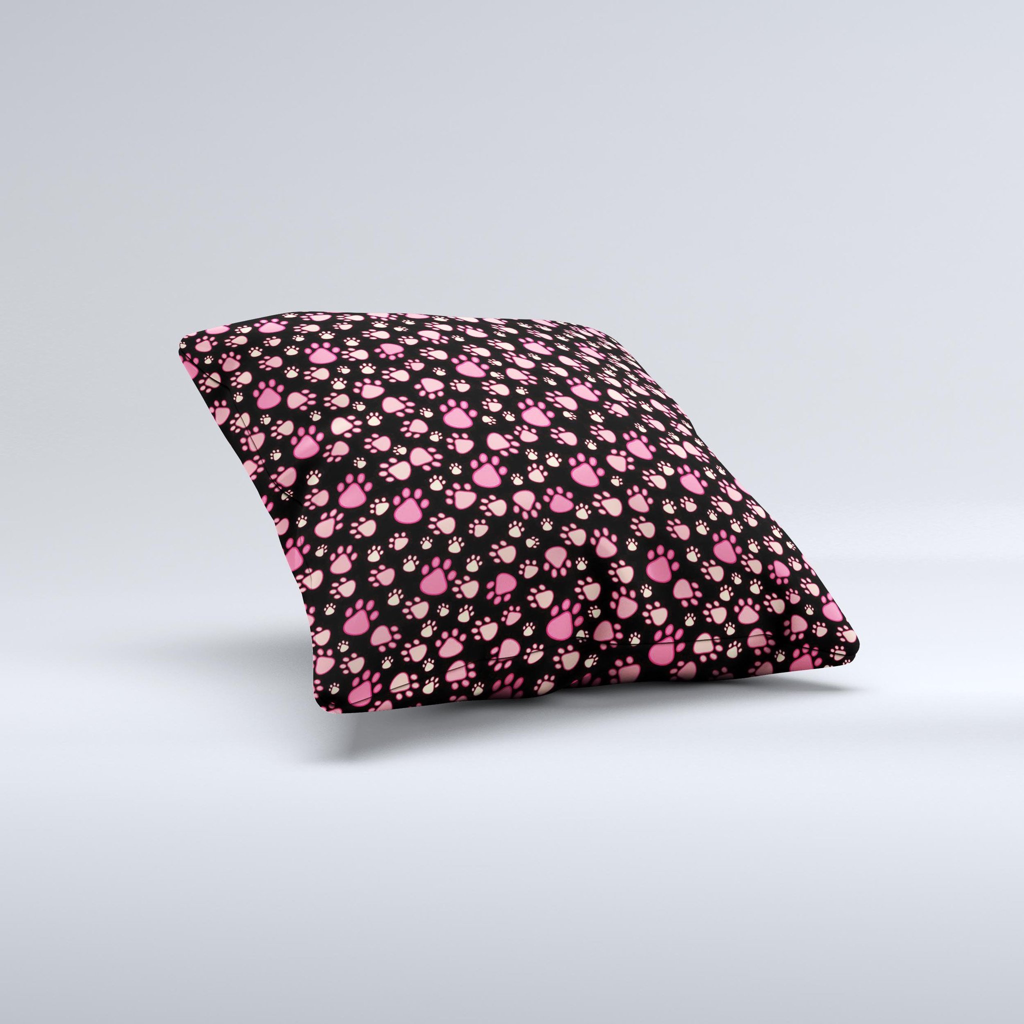 Cut Pink Paw Prints Ink-Fuzed Decorative Throw Pillow featuring a unique paw print design on a soft fabric, handcrafted in Virginia.