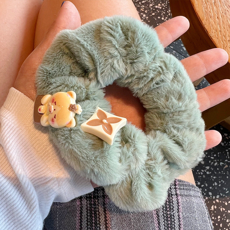 Cute Bear Furry Hair Tie featuring a plush bear design, perfect for adding charm to hairstyles.