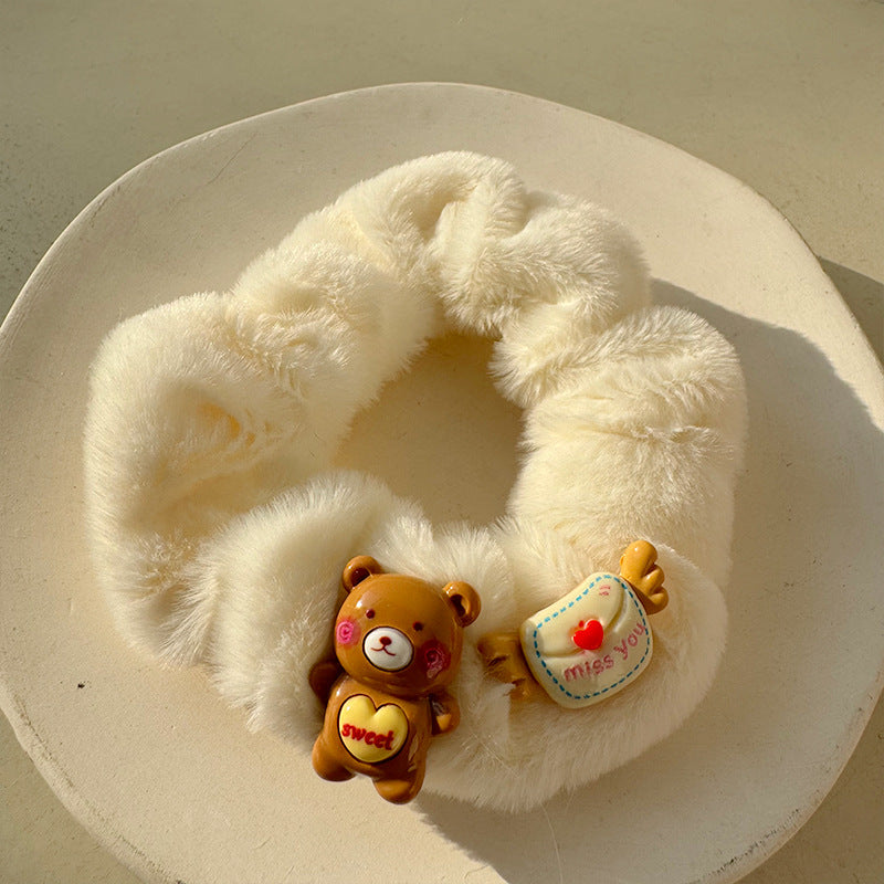 Cute Bear Plush Hair Tie featuring an adorable bear design made from soft plush material, perfect for stylish hairstyles.