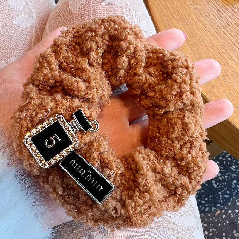 Cute Maillard Style Lamb Hair Tie featuring an adorable lamb design, perfect for adding charm to hairstyles.