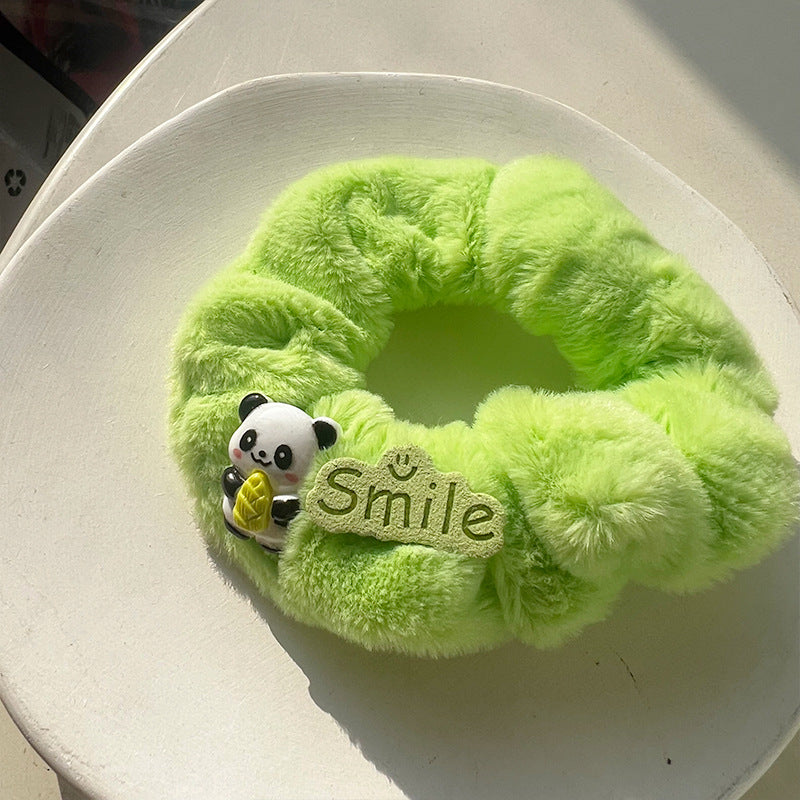 Cute Panda Plush Hair Tie featuring an adorable panda design, perfect for adding charm to hairstyles.