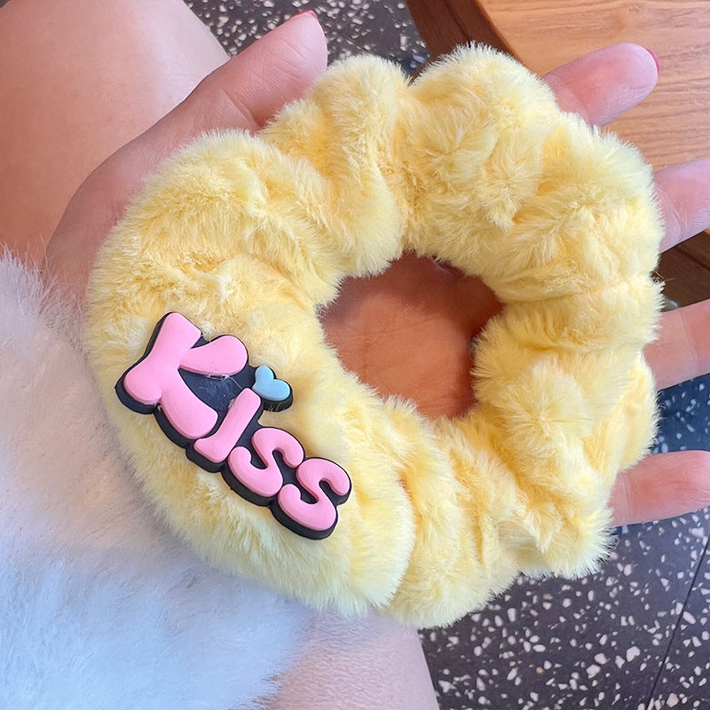 Cute Plush Hair Tie featuring soft plush material in a charming design, perfect for stylish hairstyles.