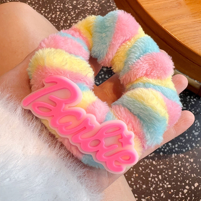 Cute Plush Hair Tie featuring soft plush material in a charming design, perfect for stylish hairstyles.