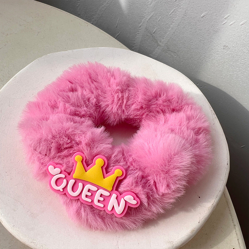 Cute Princess Pink Plush Hair Tie featuring a charming crown design in soft pink plush material, perfect for stylish hairstyles.