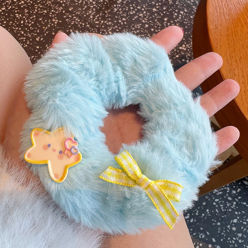 A set of four cute and soft scrunchies featuring moon-shaped rabbits and bears, perfect for adding charm to hairstyles.