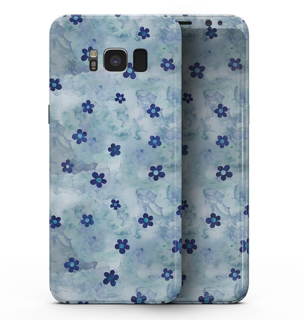 Samsung Galaxy S8 with a cute watercolor flowers full-body skin, showcasing vibrant floral patterns on a blue background.