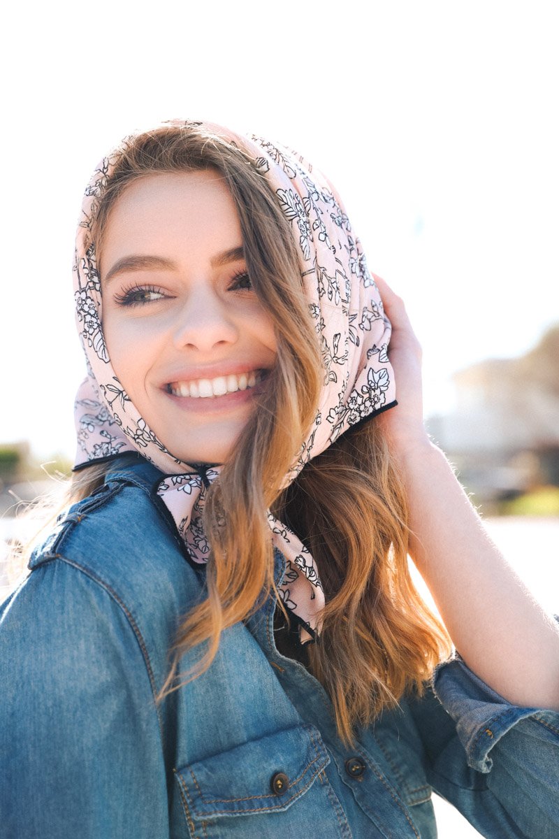 Cutesy Floral Bandana featuring a charming peach floral design, perfect for festivals and stylish outfits.