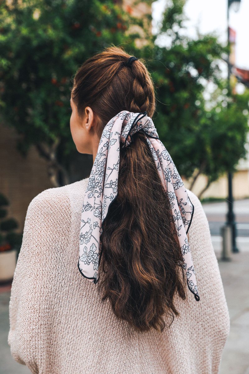 Cutesy Floral Bandana featuring a charming peach floral design, perfect for festivals and stylish outfits.