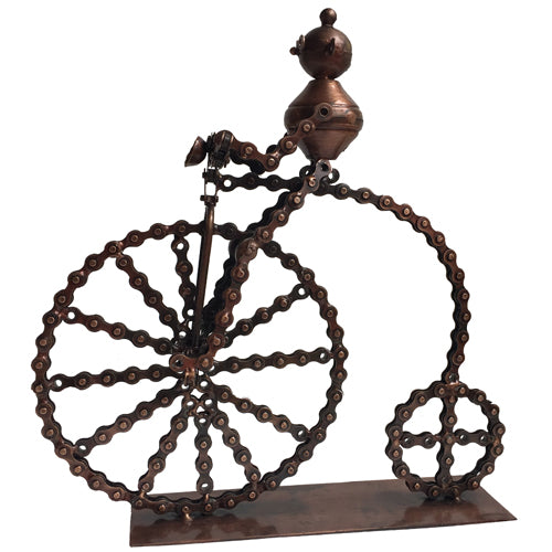 A whimsical cyclist sculpture made from recycled bicycle chains, showcasing intricate details and craftsmanship, perfect for cycling enthusiasts.