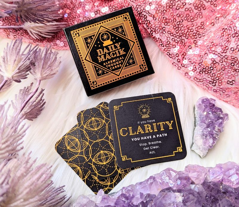 Daily Magik Card Set by Kittea Asdis featuring 33 inspirational cards in a compact size, perfect for on-the-go guidance.