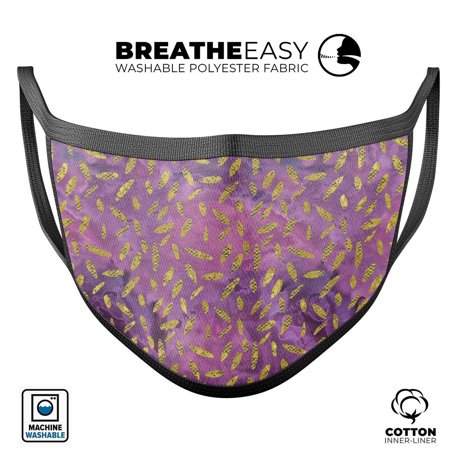 Daisy Pedals Over Purple Cloud Mix mouth cover featuring vibrant colors and adjustable ear loops, made in the USA.