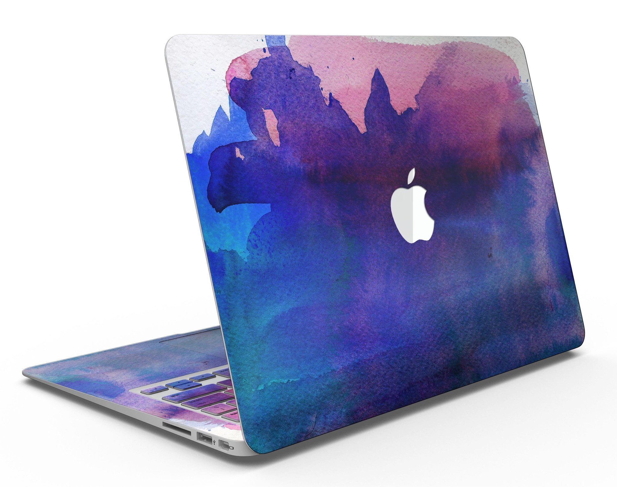 Dark Absorbed Watercolor Texture skin applied on a MacBook Air, showcasing vibrant colors and sleek design.