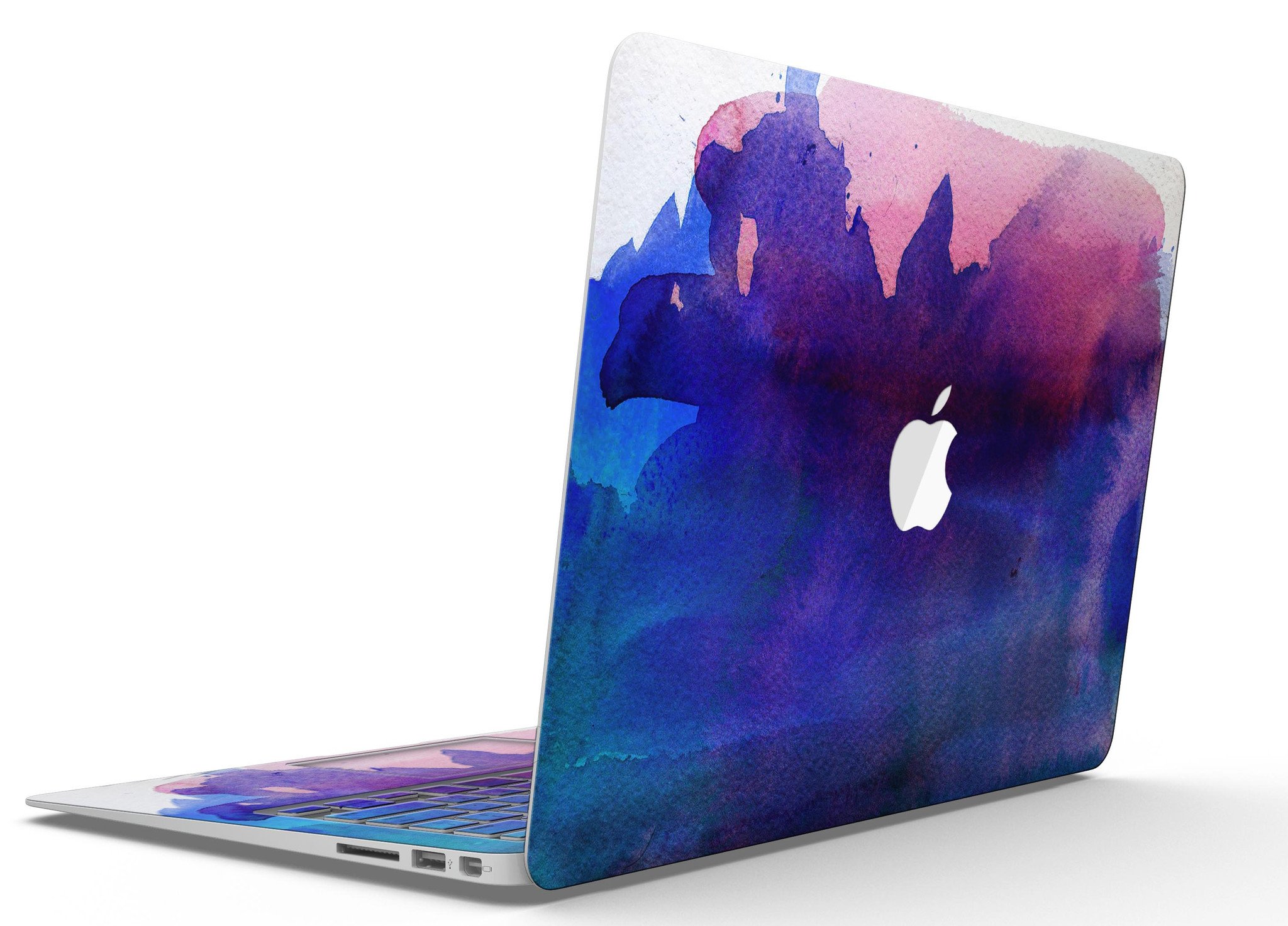 Dark Absorbed Watercolor Texture skin applied on a MacBook Air, showcasing vibrant colors and sleek design.