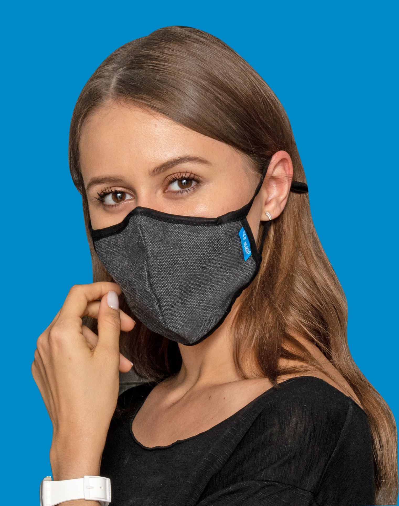 Dark Blue Canvas Mask featuring a breathable design with a removable inner layer and adjustable ear toggles for a comfortable fit.