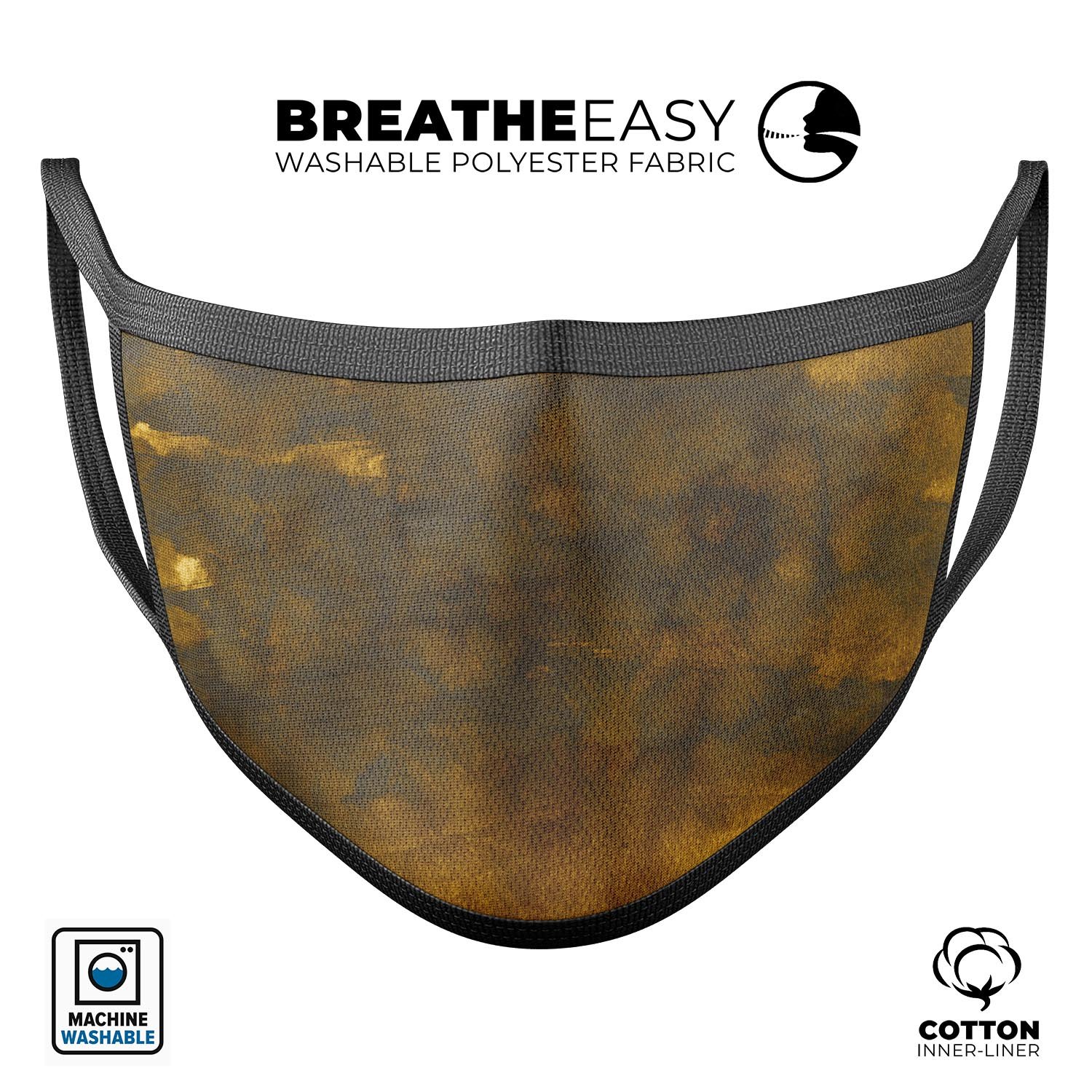 Dark Gray Storm face mask with golden light accents, showcasing a stylish design suitable for unisex wear.