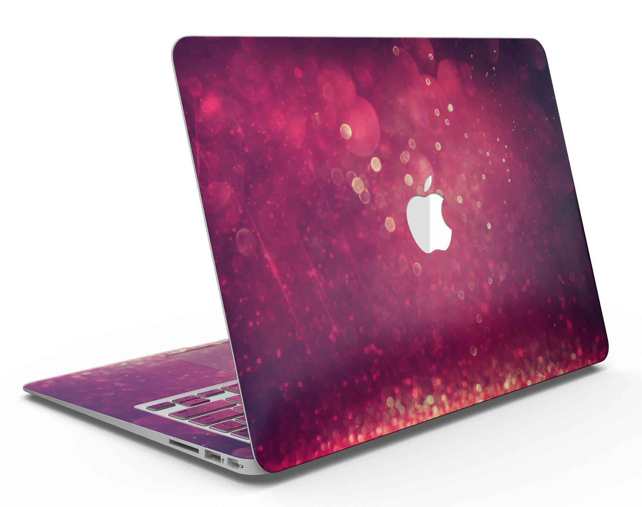 Dark pink shimmering orbs of light MacBook Air skin kit showcasing its vibrant design and premium vinyl material.