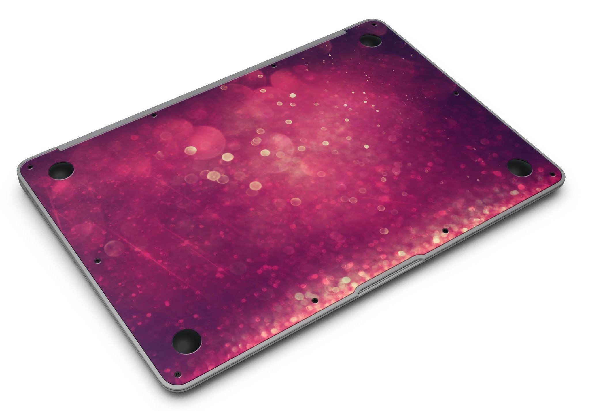 Dark pink shimmering orbs of light MacBook Air skin kit showcasing its vibrant design and premium vinyl material.