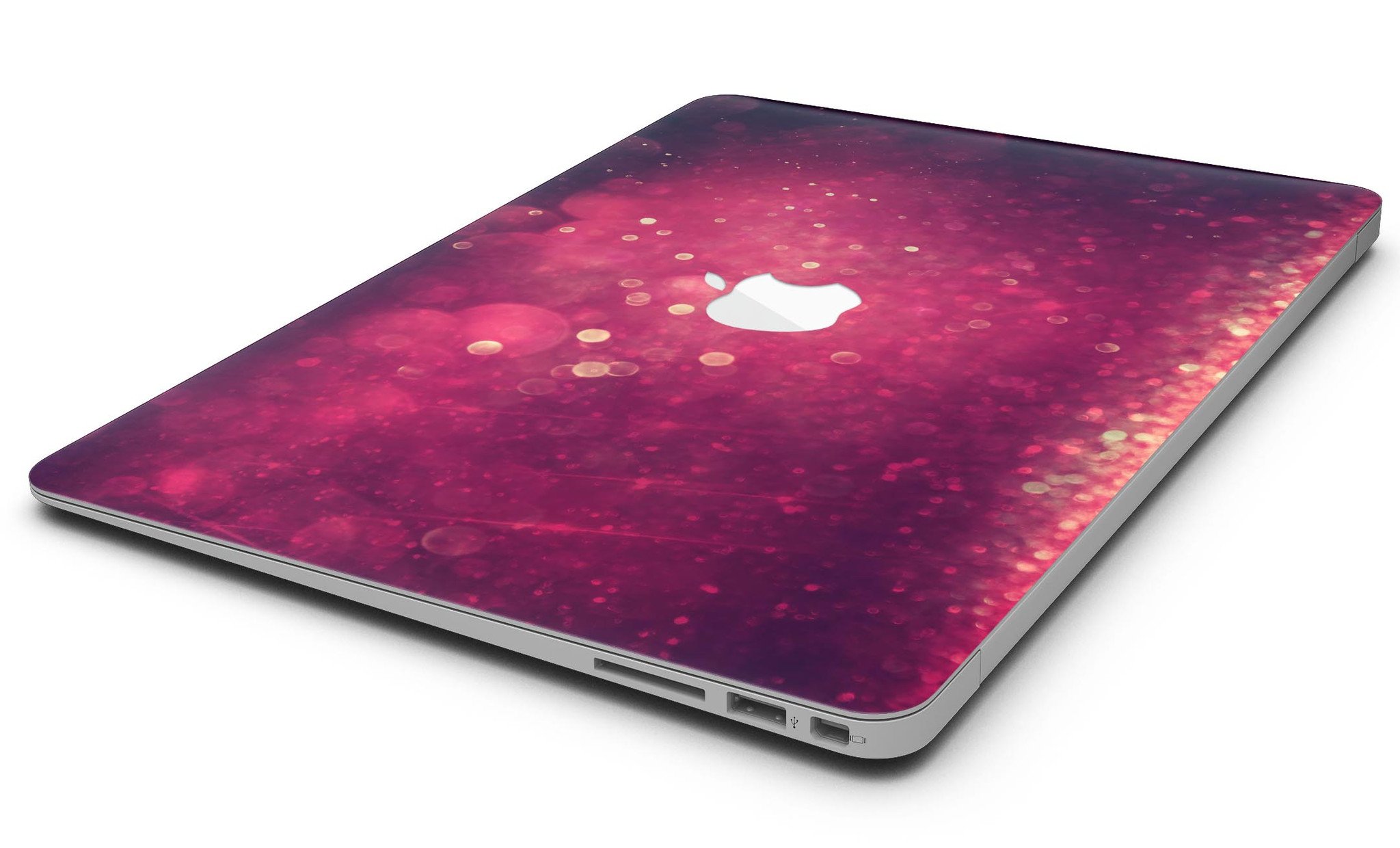 Dark pink shimmering orbs of light MacBook Air skin kit showcasing its vibrant design and premium vinyl material.