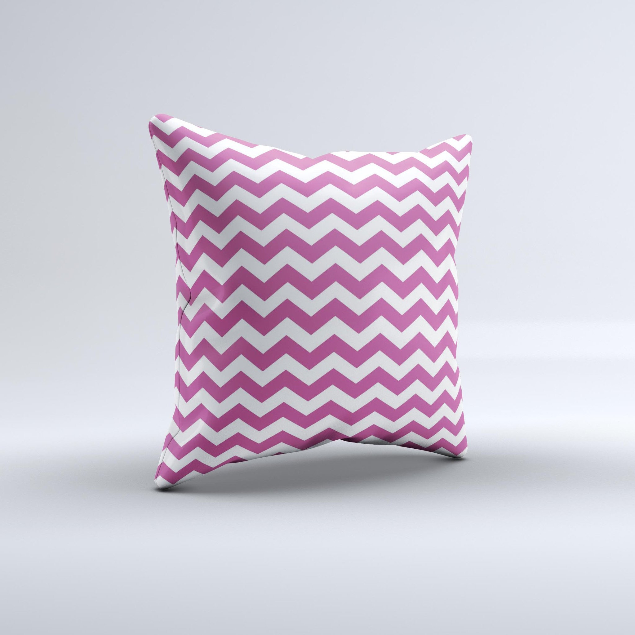 Dark pink and white chevron patterned decorative throw pillow, handcrafted with high-quality materials, showcasing a unique design.