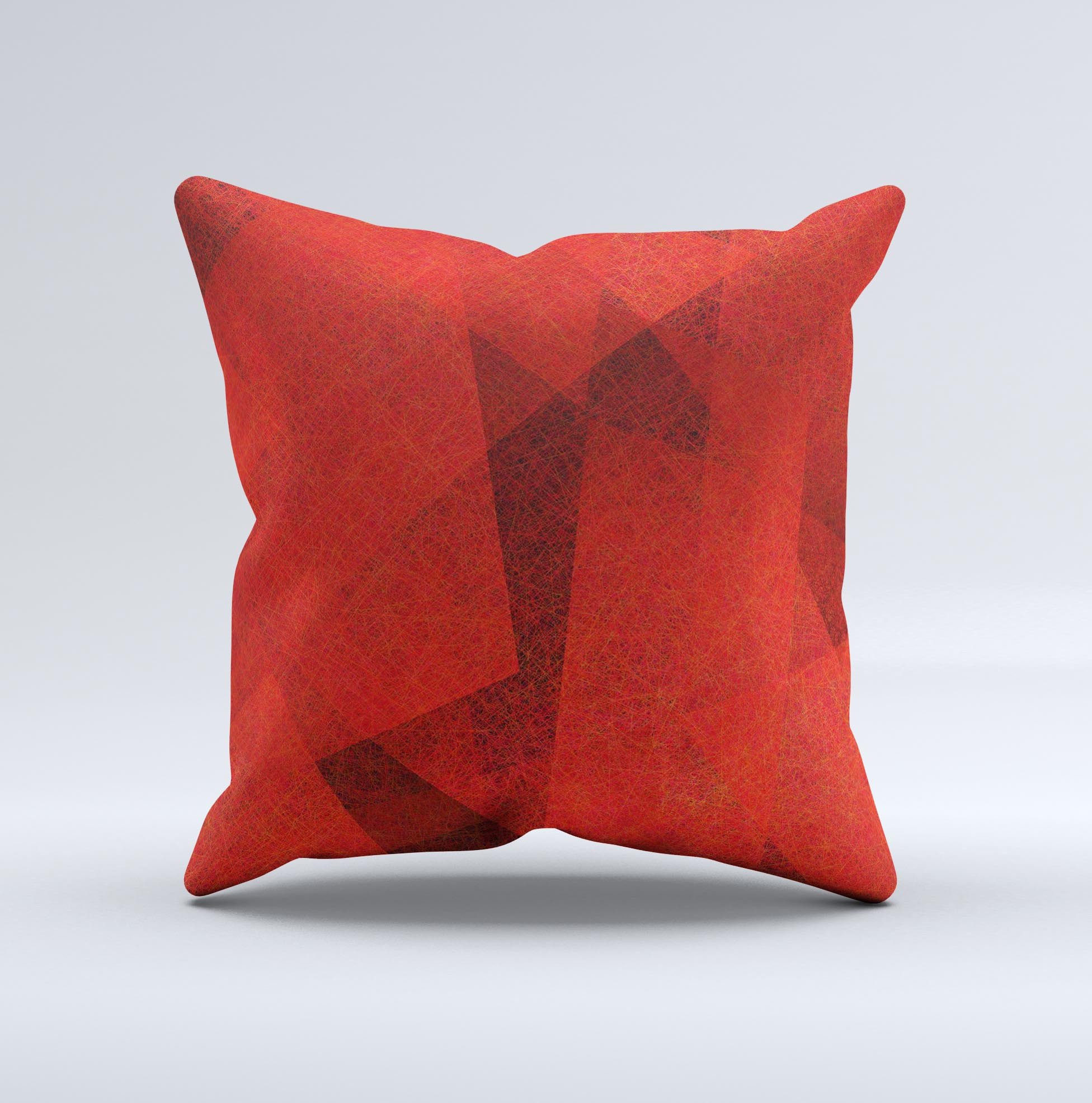 Dark red decorative throw pillow with translucent shapes, handcrafted in Virginia, showcasing unique design and high-quality fabric.