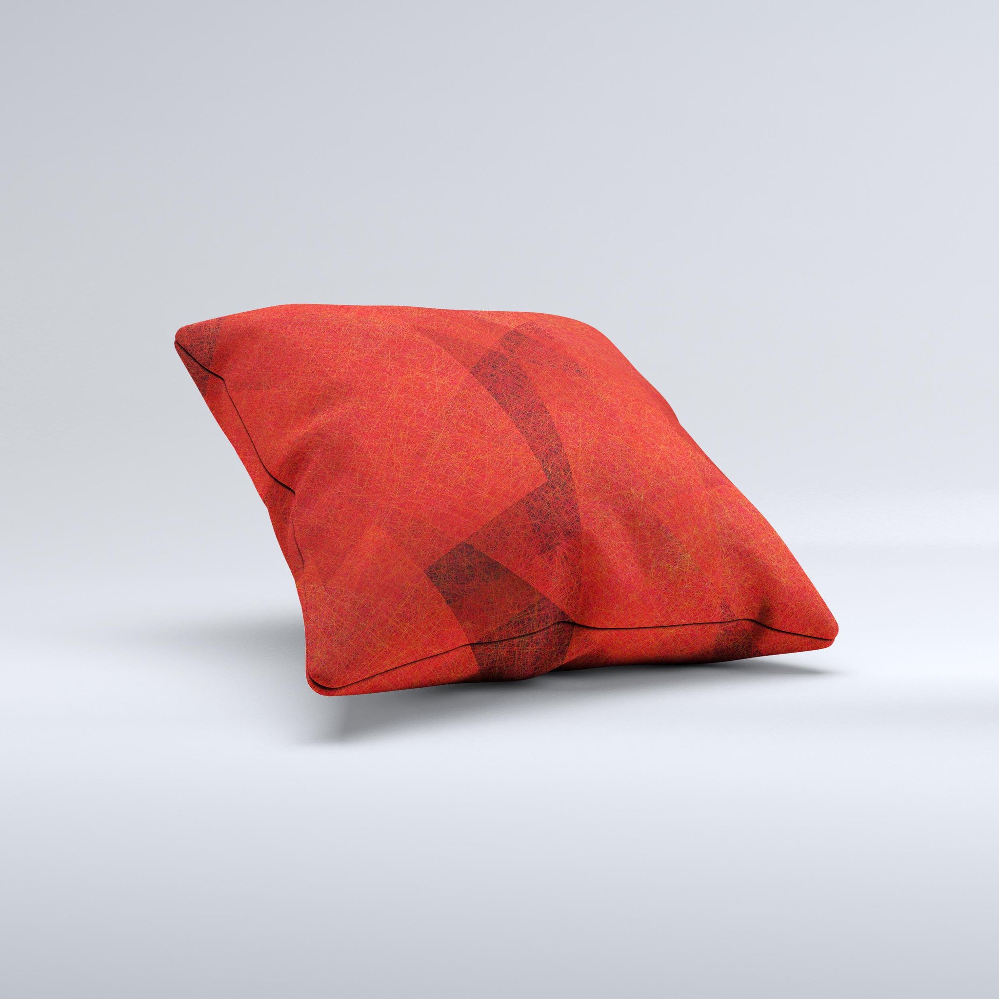 Dark red decorative throw pillow with translucent shapes, handcrafted in Virginia, showcasing unique design and high-quality fabric.