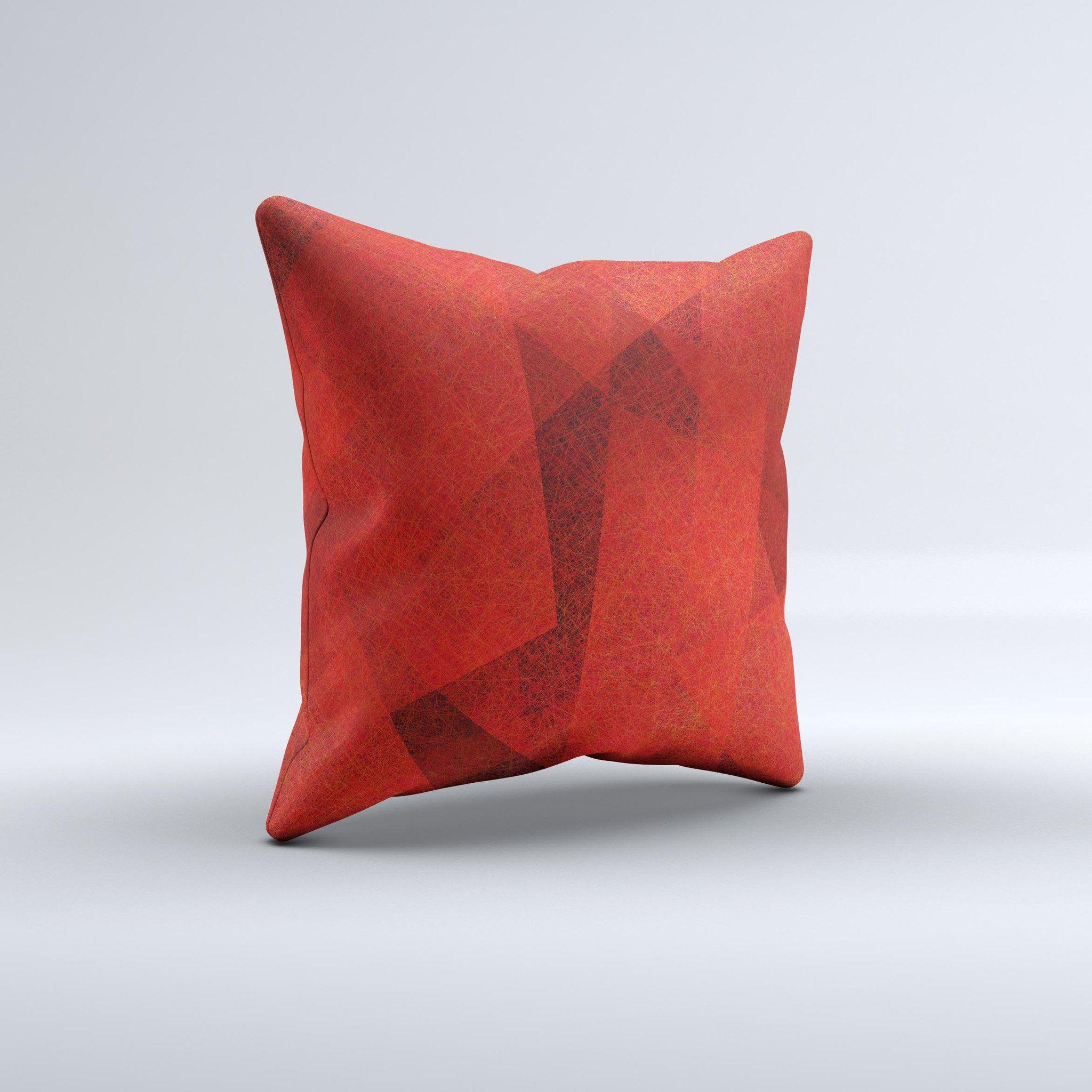 Dark red decorative throw pillow with translucent shapes, handcrafted in Virginia, showcasing unique design and high-quality fabric.