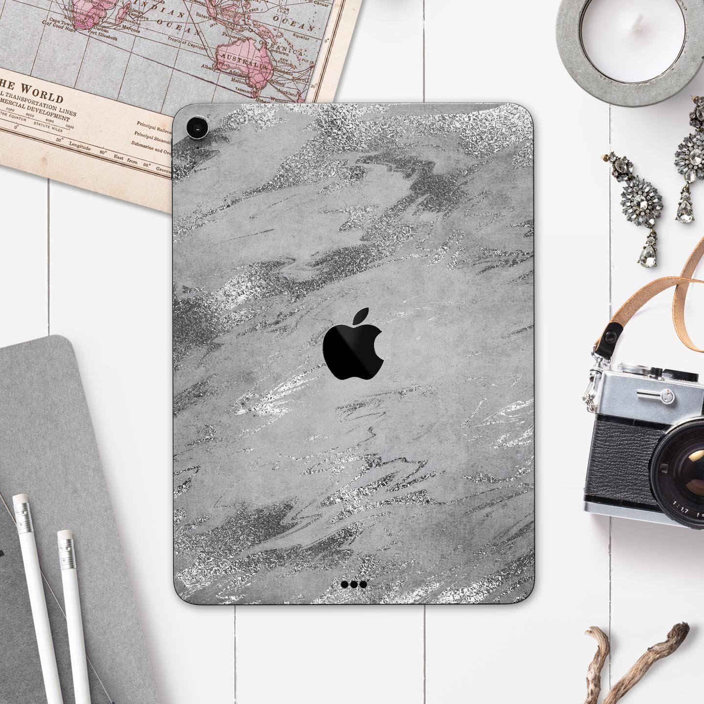 Dark Silver Marble Swirl V9 skin decal for Apple iPad, showcasing a stylish marble design with a smooth finish.