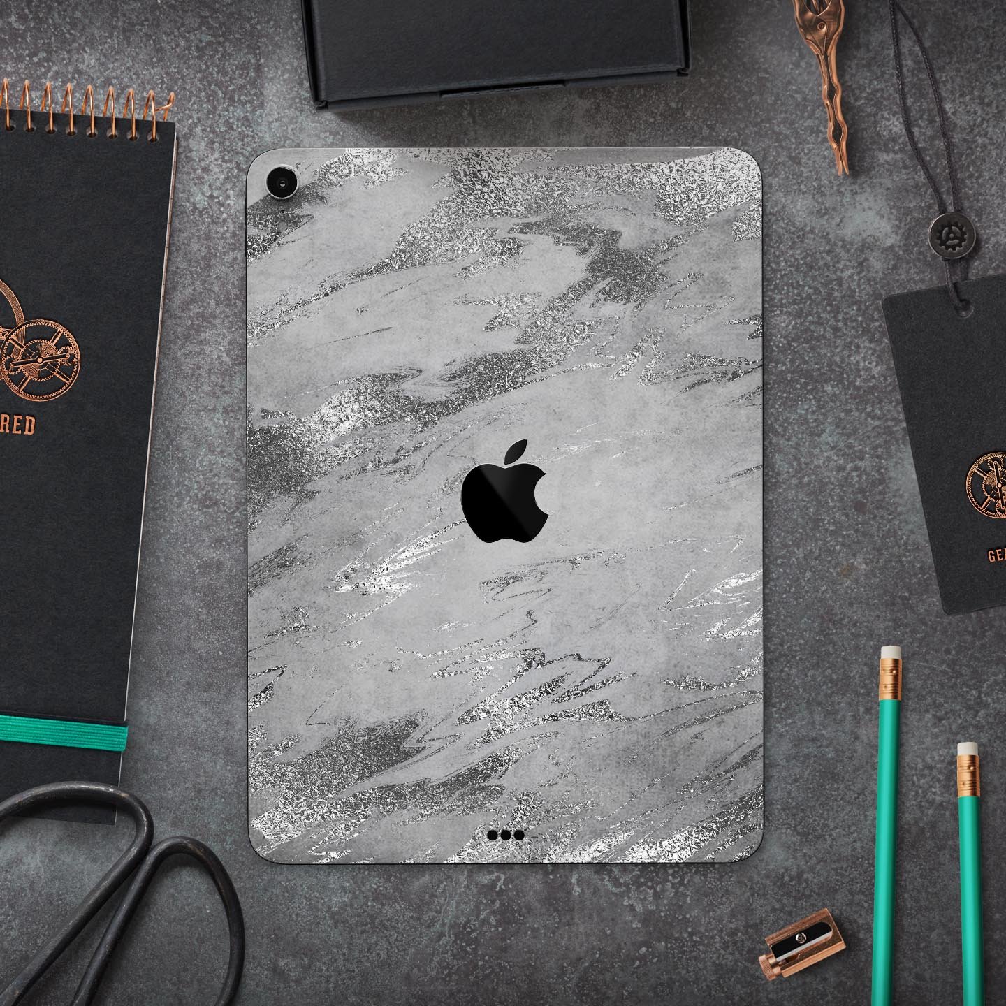 Dark Silver Marble Swirl V9 skin decal for Apple iPad, showcasing a stylish marble design with a smooth finish.