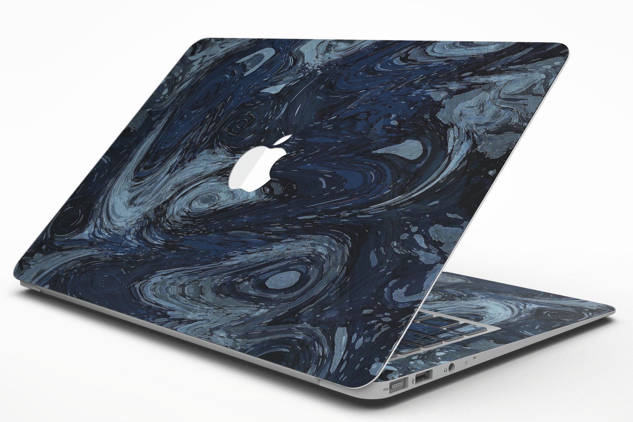 Dark Slate Marble Skin Kit for MacBook Air, showcasing a sleek marble design that enhances the device's appearance while providing protection.