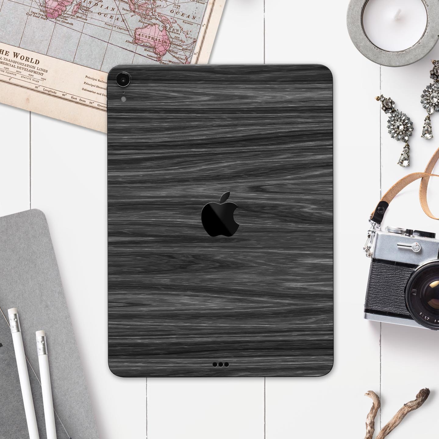 Dark Slate Wood skin decal for Apple iPad Pro 12.9", showcasing its premium finish and design.