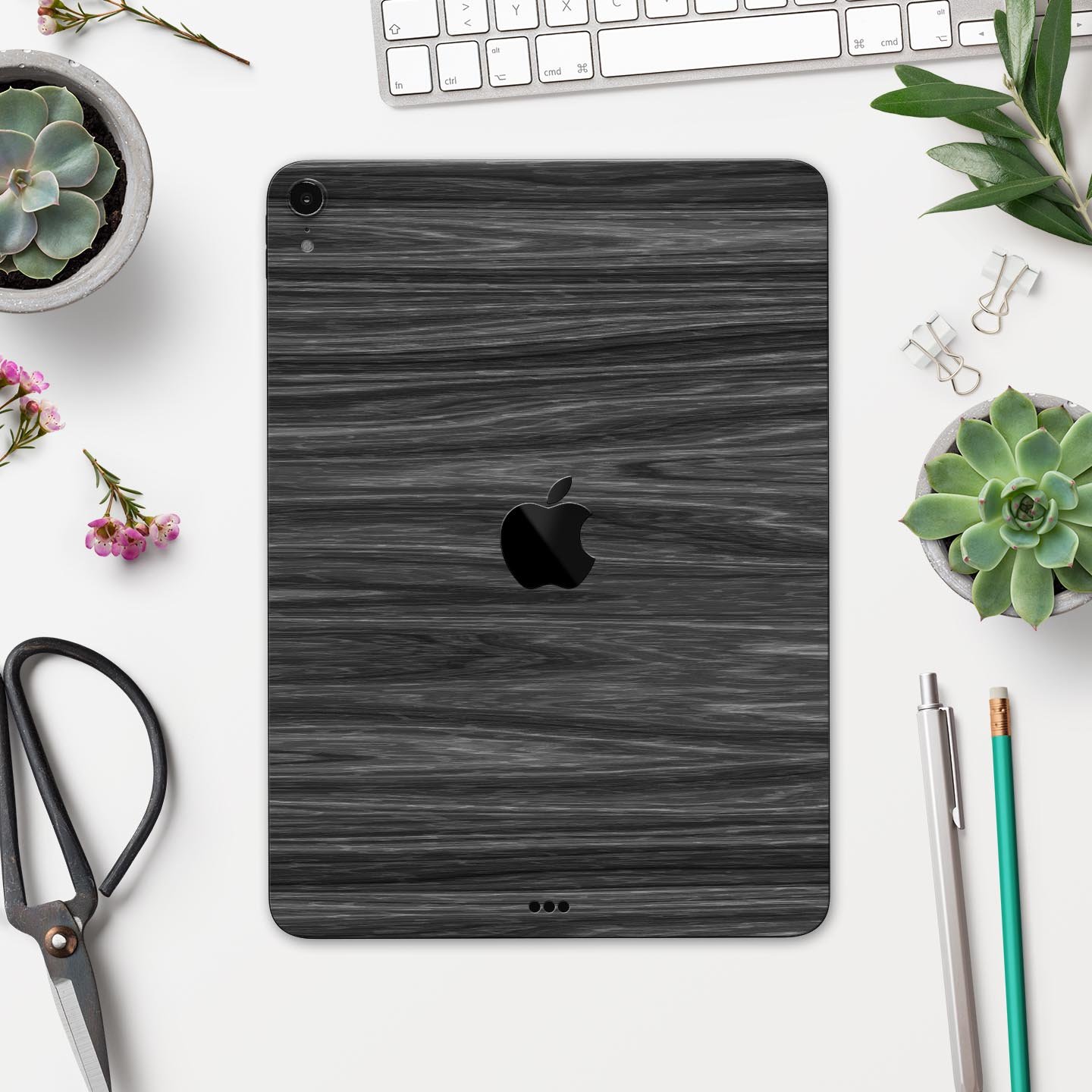 Dark Slate Wood skin decal for Apple iPad Pro 12.9", showcasing its premium finish and design.