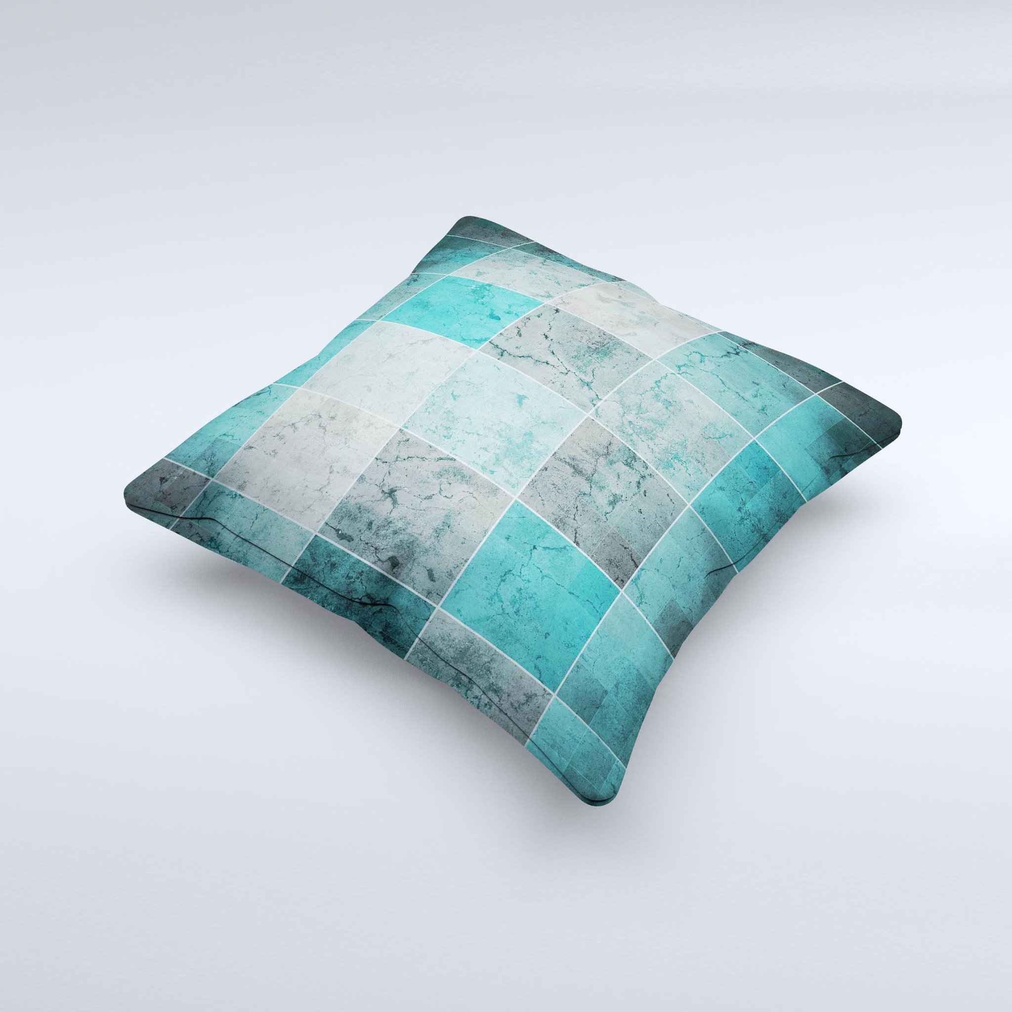 Dark teal decorative throw pillow with tiled pattern, handcrafted in Virginia, showcasing unique imperfections.