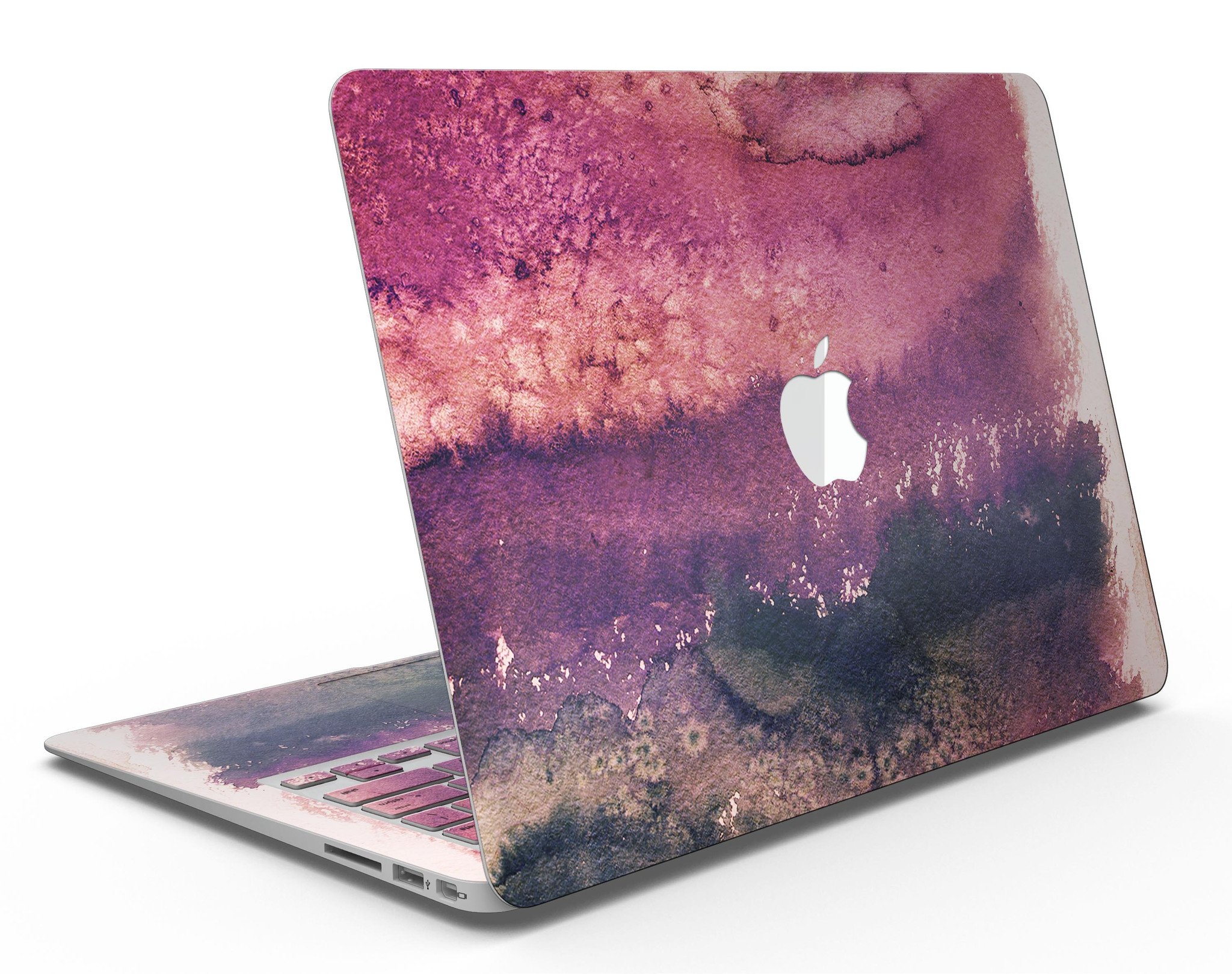 Dark v2bsorbed Watercolor Texture skin applied to a MacBook Air, showcasing vibrant colors and sleek design.