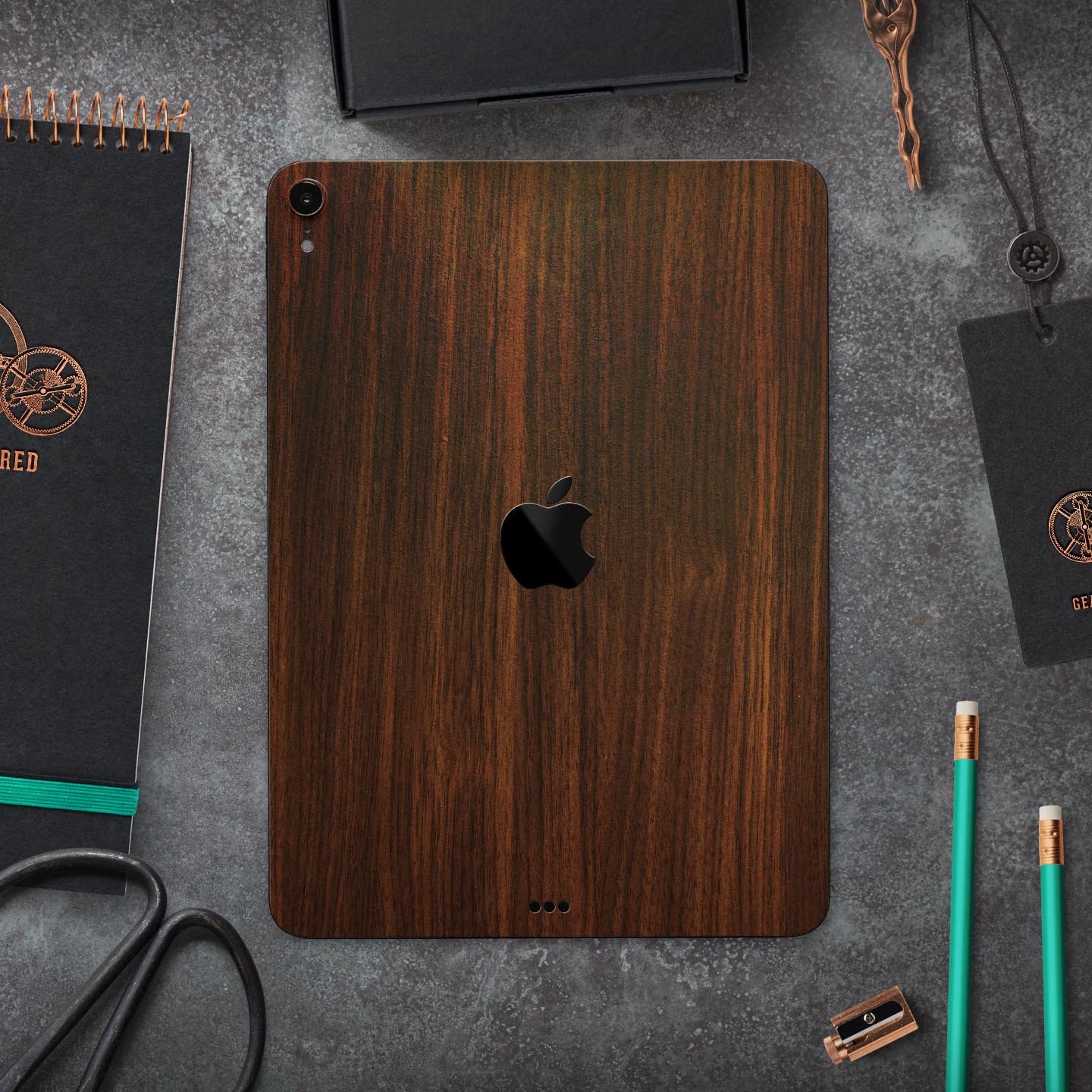 Dark Walnut Stained Wood Full Body Skin Decal for Apple iPad Pro, showcasing a rich wood texture and sleek design.