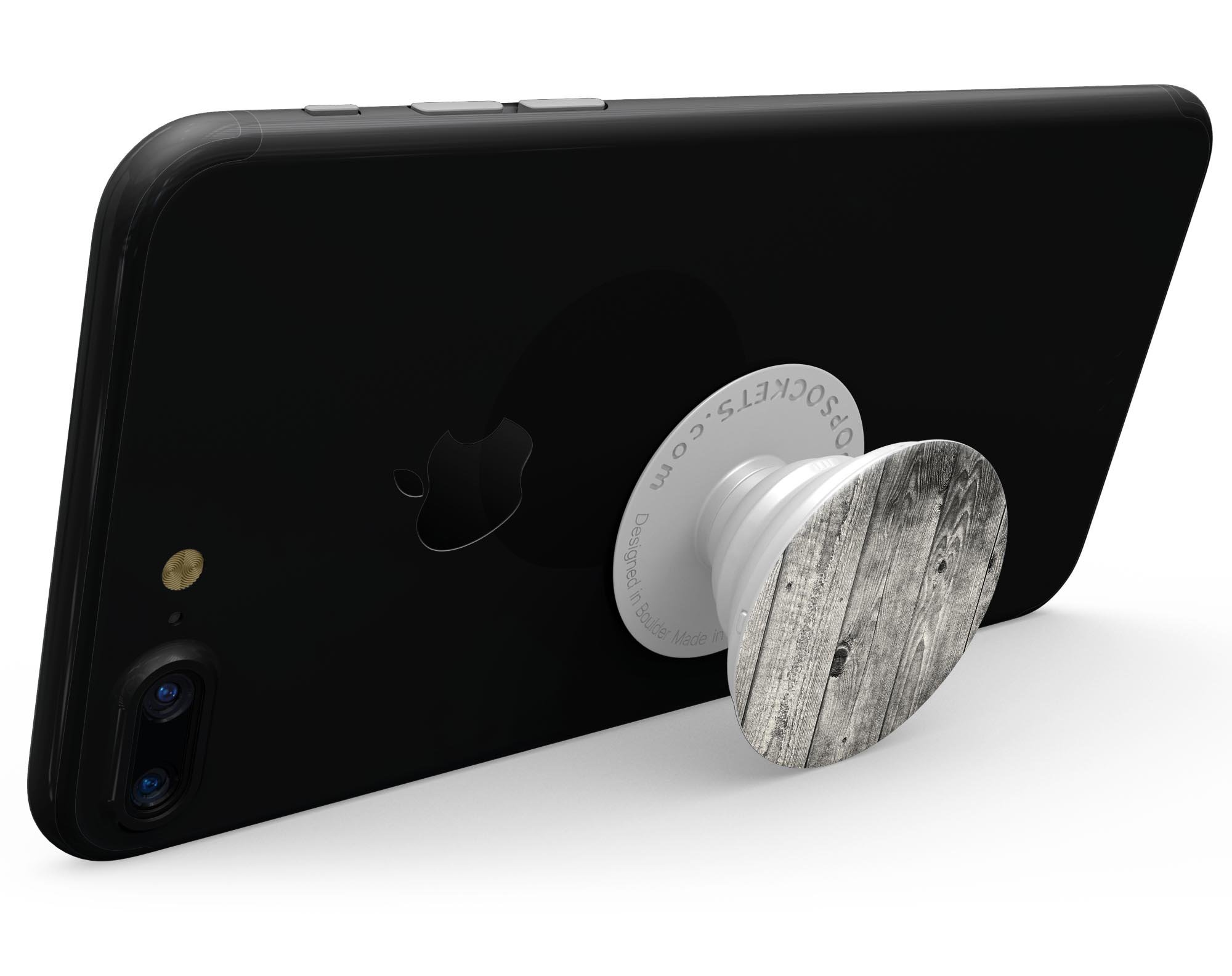 Dark Washed Wood Planks Skin Kit for PopSockets, showcasing a stylish wood design on a smartphone grip.